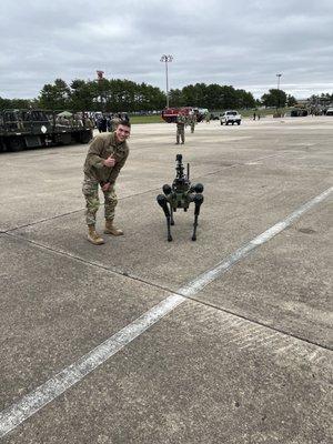 Airman Franklin striking a pose with our drone dog