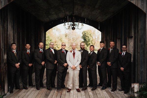 Groomsmen with mismatched shoes.