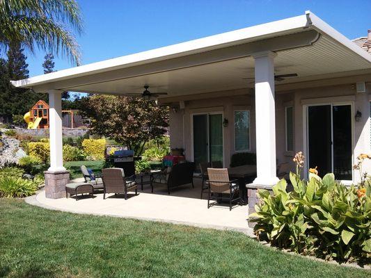 Stucco columns add a custom look and tie the patio cover into the house design.