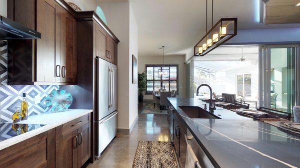 Custom Cabinetry and Quartz tops. Polished concrete floor.