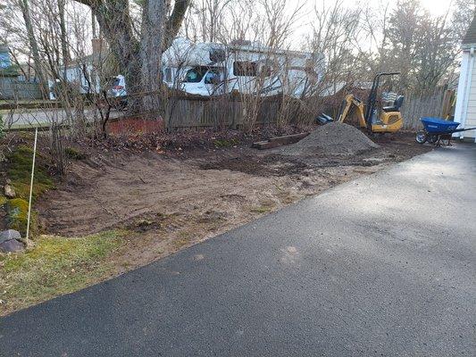 Driveway extension with a timber wall border