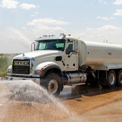 4,000 gallon mack water truck using our hydraulic 5-spray system.