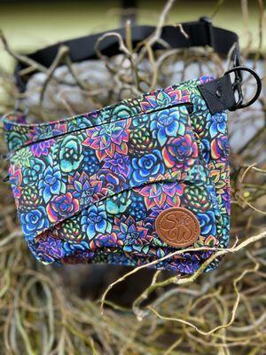 Succulents are vibrant colors on this hip bag.