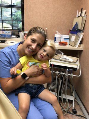 Our amazing dental hygienist treating her beautiful children!! Rachel is caring extremely thorough and gentle.