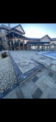 Parker project !! 3,000 sq ft project castle flats with a doble border charcoal 6x9 cobble serious.