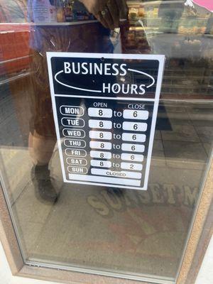 Store hours on the door