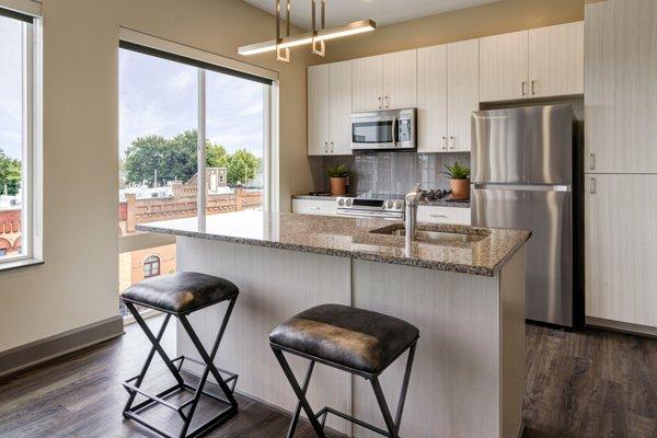 Kitchens equipped with stainless steel appliances, and unique hardware