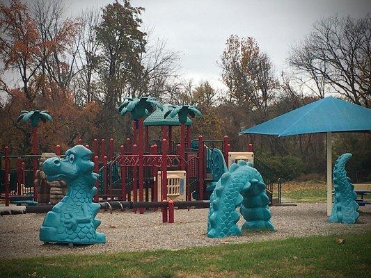 A whimsical dragon inhabits the playground.