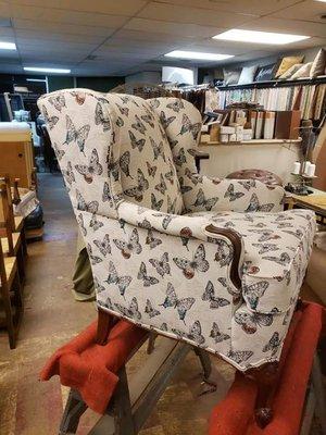 Chair upholstered with butterfly fabric