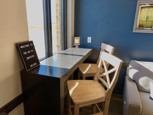 Worktop with USB power outlets to get some work done while you wait for your family.