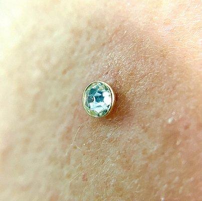 Dermal Anchor implant with 14k Gold Cubic Zirconium Bezel set.