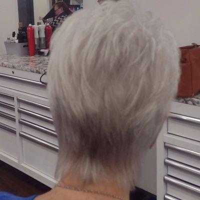 Razor cut on natural platinum hair.