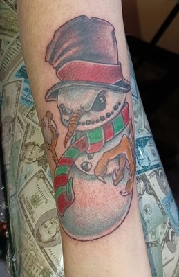 This is a very naughty snowman, Christopher@717tattoo.com.