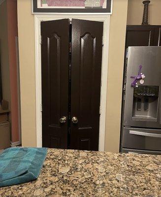 Pantry door that we painted along with all kitchen cabinets.