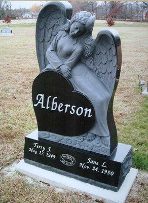 Beautiful black granite angel monument for two people.