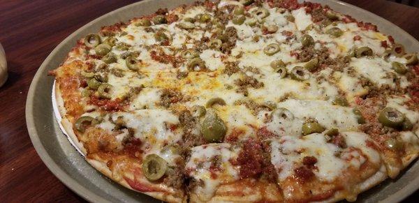 14in pepperoni, Italian sausage, green olives and xtra cheese... my "go to" pizza!