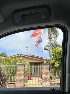 This is in front of Dr Carsuso's house. Upside down American Flag flying on purpose all year round.