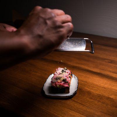 Chef Martin prepares the Steak Tartare on the Chef's Table menu