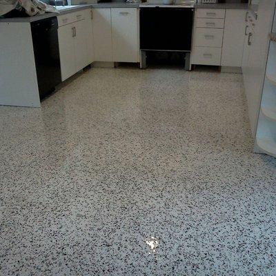 Kitchen Floor Epoxy Chip over wood substrate. Waterproof and scratch resistant