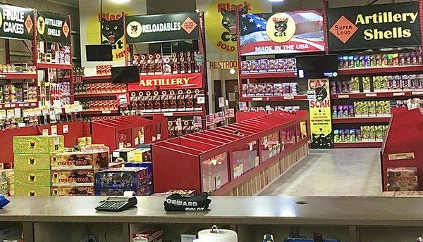 About half the fireworks store is seen in this photo.