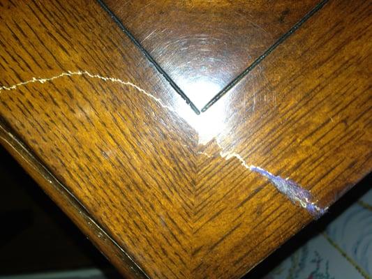 antique side table that they broke and glued back together!