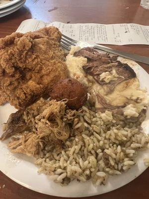 Fried Chicken, pot roast, pulled pork, dirty rice, mashed potatoes & gravy....it's all good & freshly made.