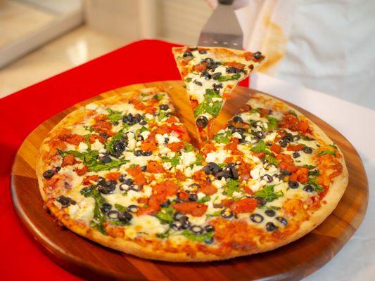 Greek Pie: Tomatoes, black olives, spinach, feta, Anchovies