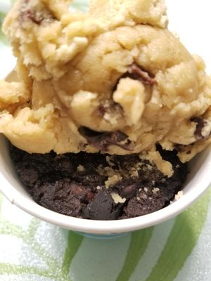 Chocolate chunk cookie dough on top with brownie dough on bottom.