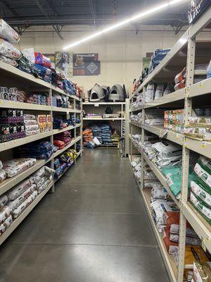 Many aisles of dog food, treats and supplies