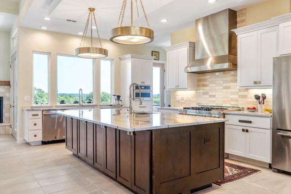 custom designed chef's kitchen with large picture windows and stainless steel appliances. San Antonio Custom Home Builder