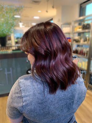 This client had previously black colored hair, we did a color correction service to get her to this beautiful, vibrant burgundy.