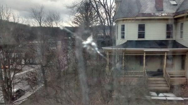 Bullet hole in window.