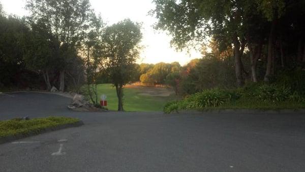 looking down at the drive in from the parking lot up top