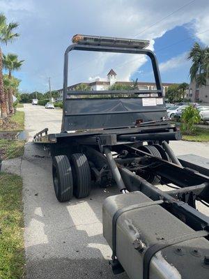 95 Towing, roll back, flatbed towing truck picking up my box truck.