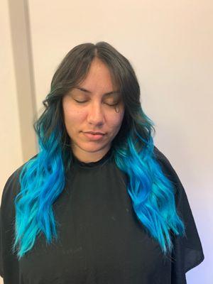 Hair extensions with Aquamarine and jade color .