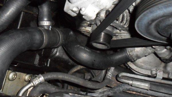 crimped hose lower left in photo