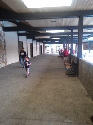 Covered corridor to locker rooms.