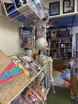 Mr. Skeleton making sure no one steal comic books Or figurines :)