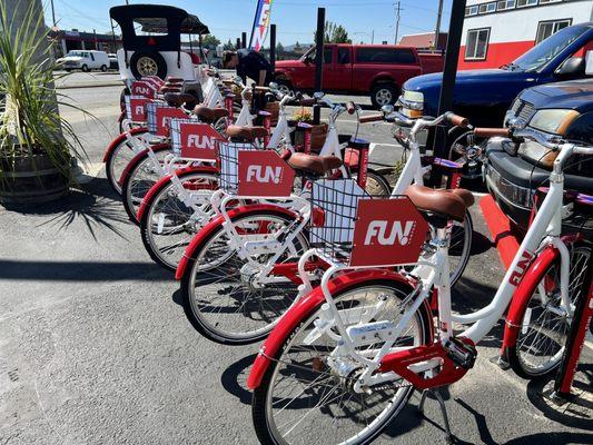 FUN! has self-serve bikes. They are just across the street from the beginning of the Row River Trail.