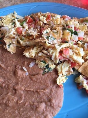 Migas breakfast plate with beans. Delicious.