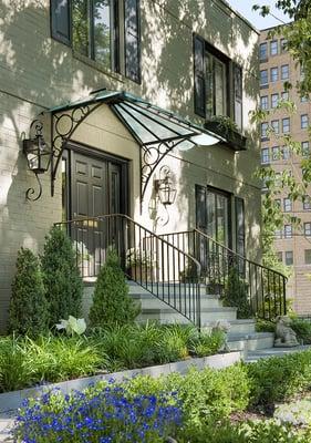 Custom glass and wrought iron portico in Woodley Park