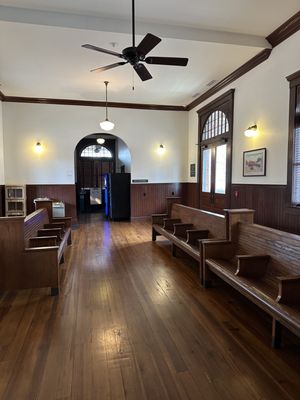 Back seating area/vending machine and restroom area.