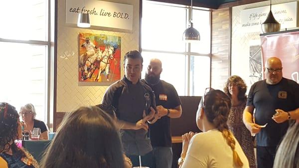 The GM, Justin, explaining the Bolay concept to us Yelpers