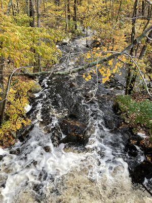 A rushing cascade at the Mill Pond dam which powered the old mill