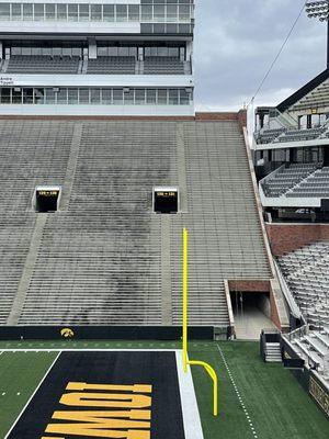 Power washing bleachers at Kinnick Stadium.