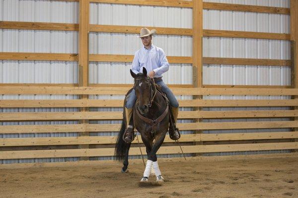 Cody doing turn on the forehand on Louie.