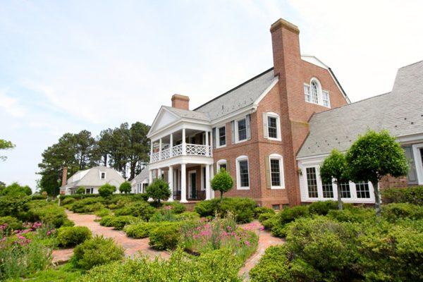 Formal Gardens play to the water.