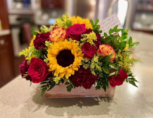 Sunflower and mixed roses bouquet.