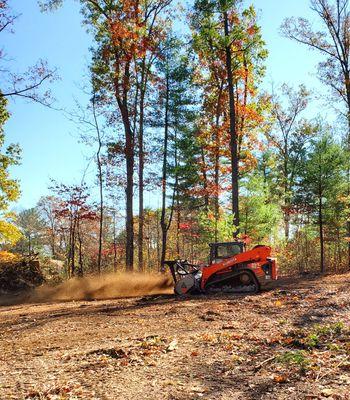 Forestry mulching is a form of land clearing that utilizes a single machine to carefully cut, grind, and clear out vegetation