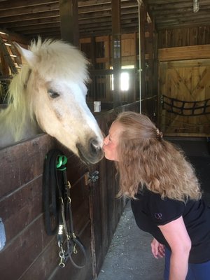 One of our helpers getting some horse kisses